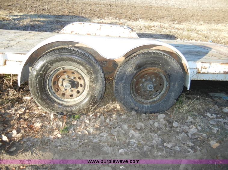 image for item A3383 2000 Titan 30' flatbed gooseneck trailer