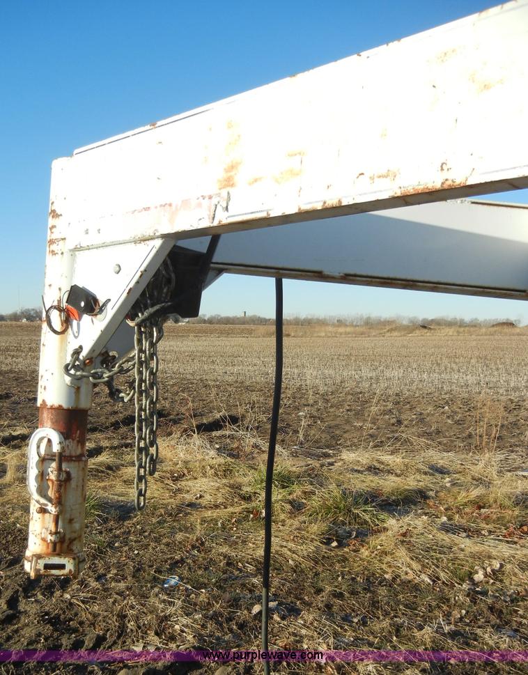 image for item A3383 2000 Titan 30' flatbed gooseneck trailer