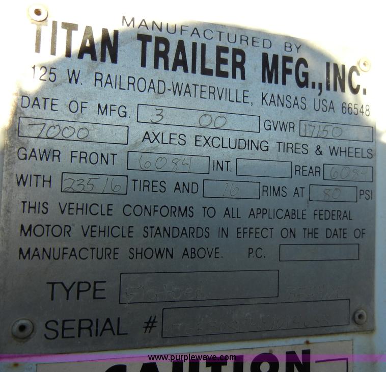 image for item A3383 2000 Titan 30' flatbed gooseneck trailer