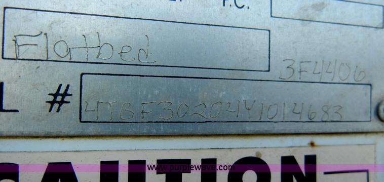 image for item A3383 2000 Titan 30' flatbed gooseneck trailer