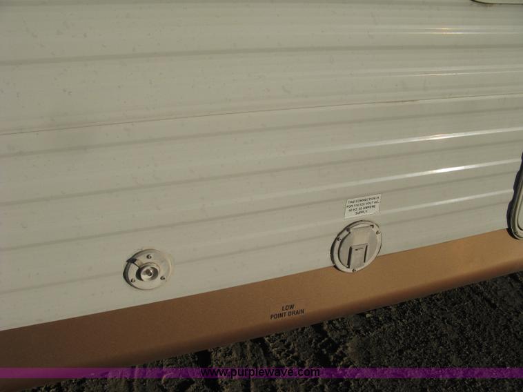 image for item A6024 2003 Jayco Qwest 324G camper trailer