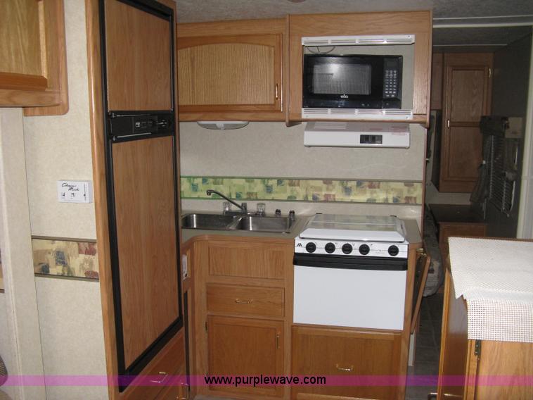 image for item A6024 2003 Jayco Qwest 324G camper trailer