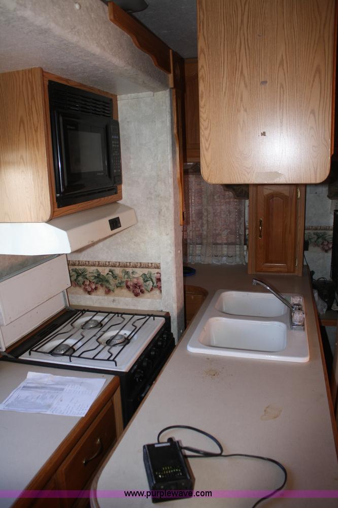 image for item A6627 2002 Montana High Country fifth wheel camper