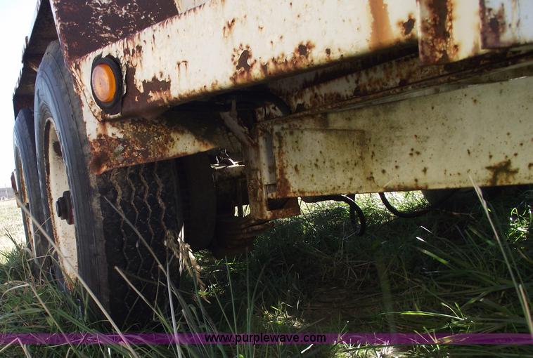 image for item B6041 (2) 20,000 lb axles with wheels and tires