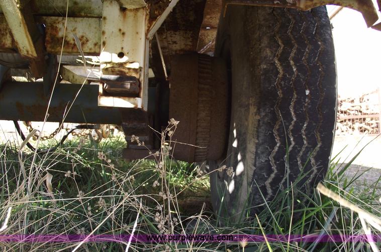 image for item B6041 (2) 20,000 lb axles with wheels and tires