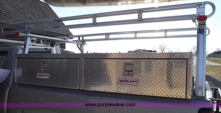 image for item B6113 (2) WeatherGuard top mounted boxes and ladder rack