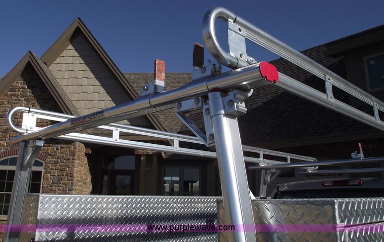 image for item B6113 (2) WeatherGuard top mounted boxes and ladder rack