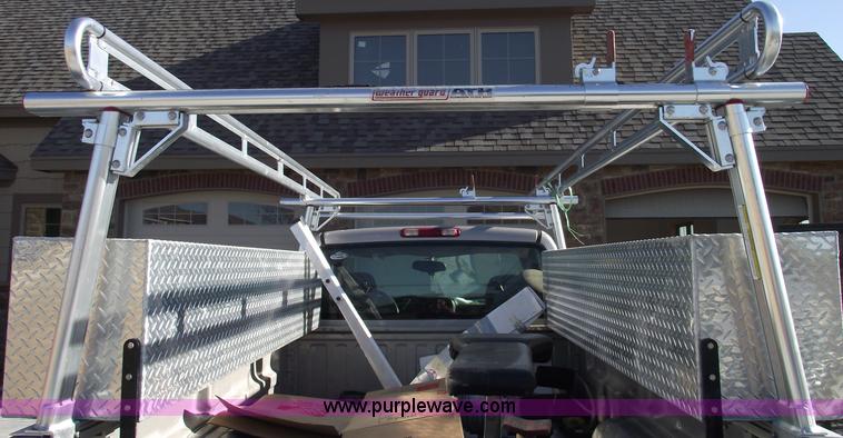 image for item B6113 (2) WeatherGuard top mounted boxes and ladder rack