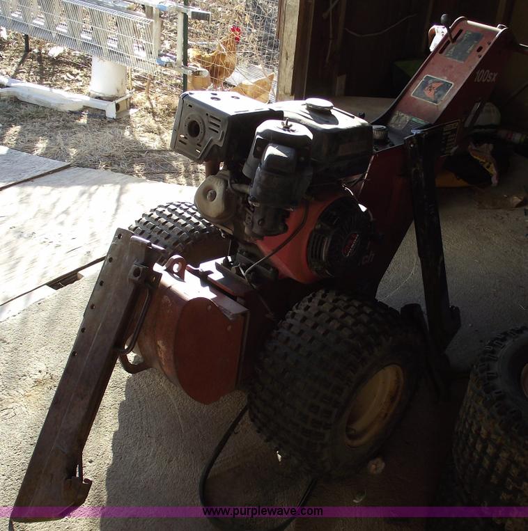 image for item B6115 2000 Ditch Witch 100SX walk behind vibratory plow