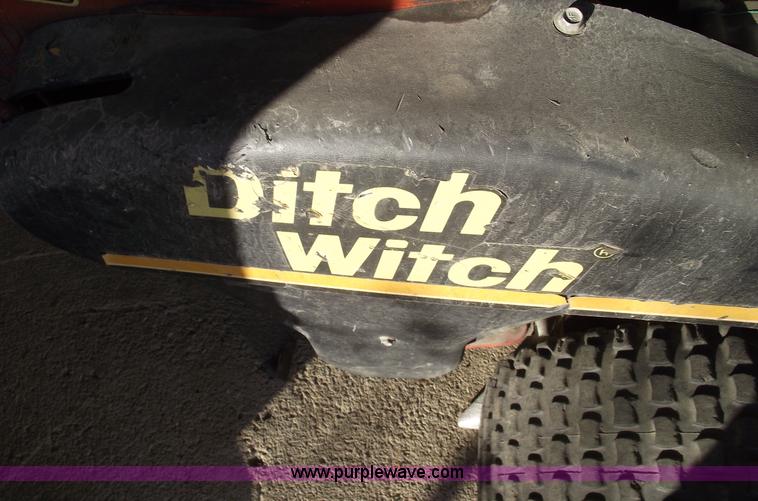 image for item B6115 2000 Ditch Witch 100SX walk behind vibratory plow