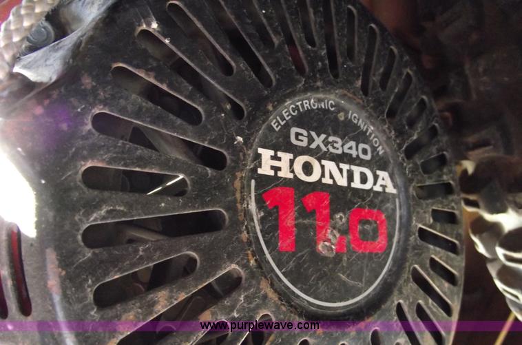 image for item B6115 2000 Ditch Witch 100SX walk behind vibratory plow