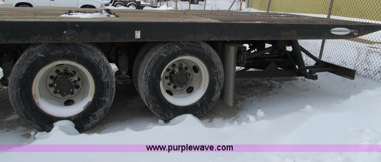 image for item B2586 2006 Freightliner M2 106 rollback truck