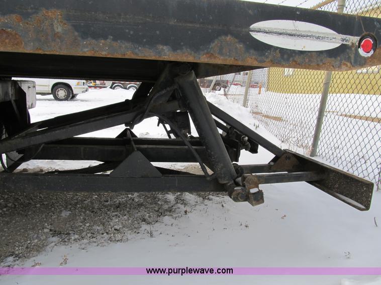 image for item B2586 2006 Freightliner M2 106 rollback truck