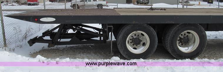 image for item B2586 2006 Freightliner M2 106 rollback truck