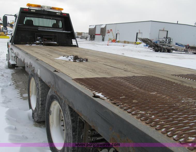 image for item B2586 2006 Freightliner M2 106 rollback truck