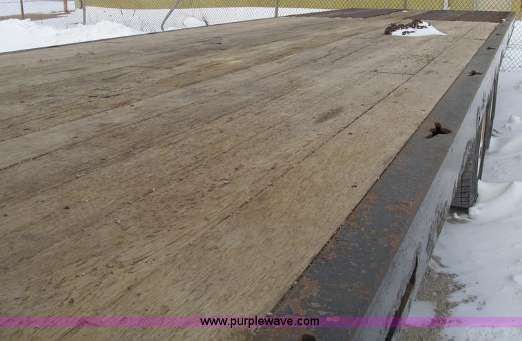 image for item B2586 2006 Freightliner M2 106 rollback truck