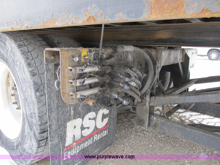 image for item B2586 2006 Freightliner M2 106 rollback truck