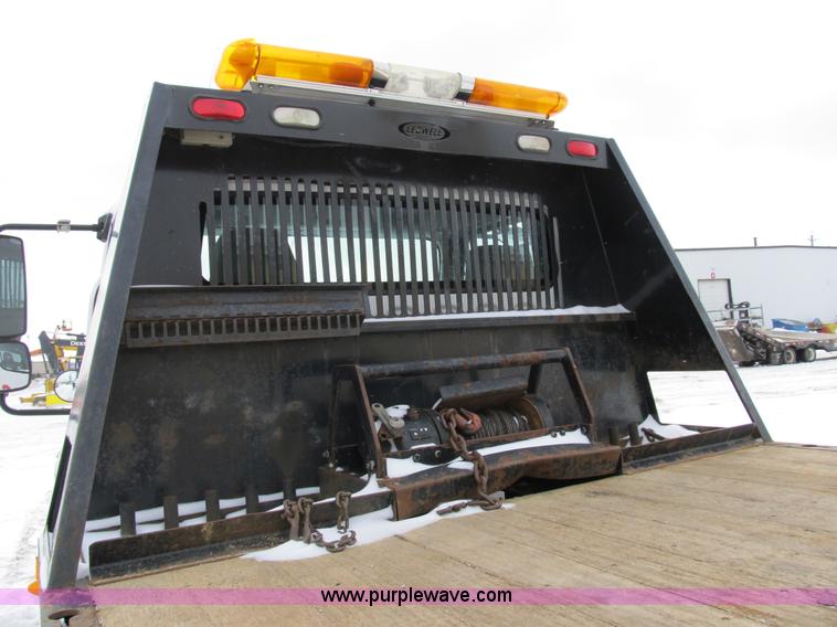 image for item B2586 2006 Freightliner M2 106 rollback truck