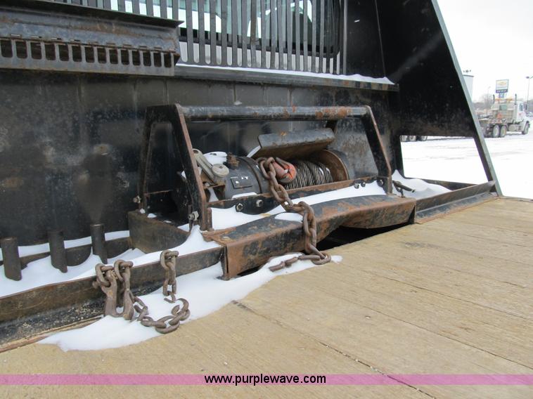 image for item B2586 2006 Freightliner M2 106 rollback truck