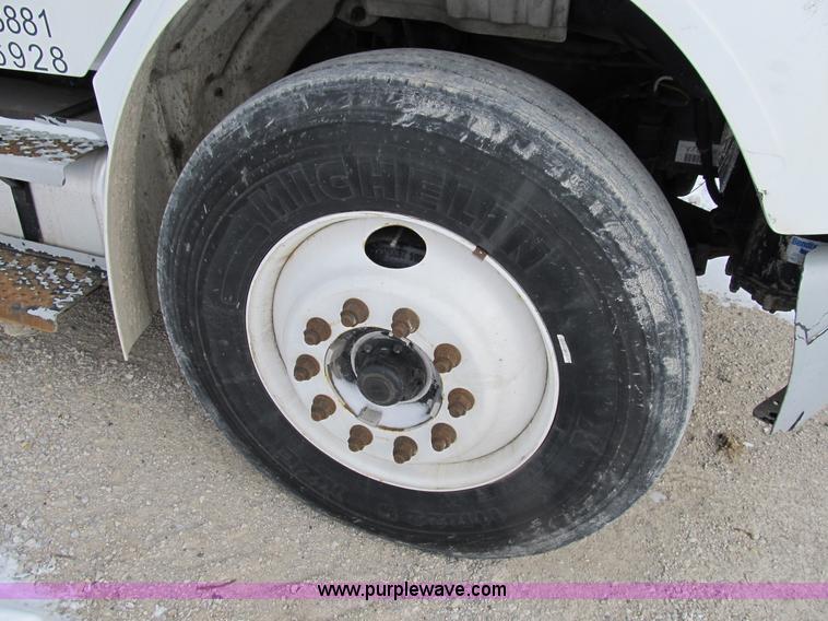 image for item B2586 2006 Freightliner M2 106 rollback truck