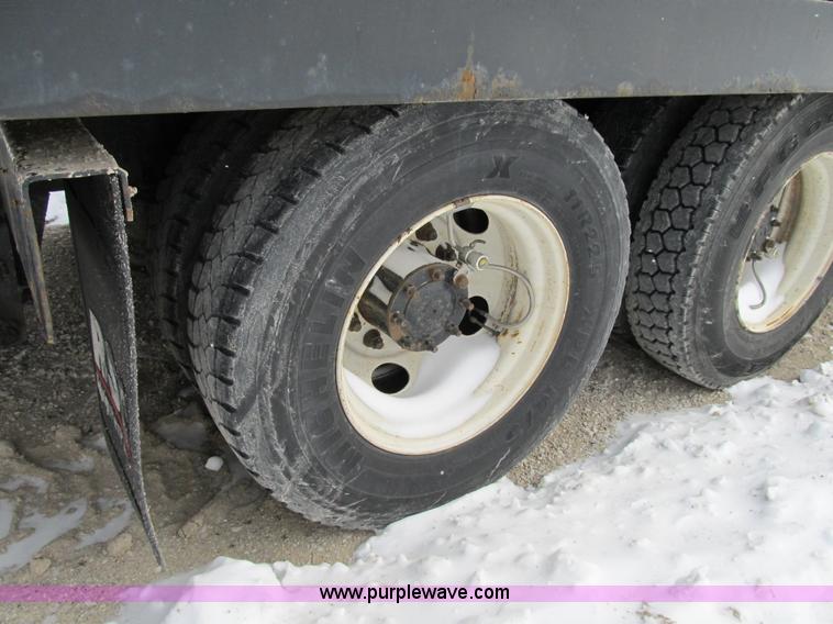 image for item B2586 2006 Freightliner M2 106 rollback truck