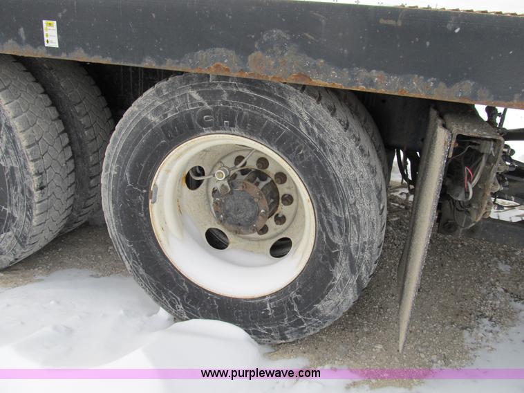 image for item B2586 2006 Freightliner M2 106 rollback truck