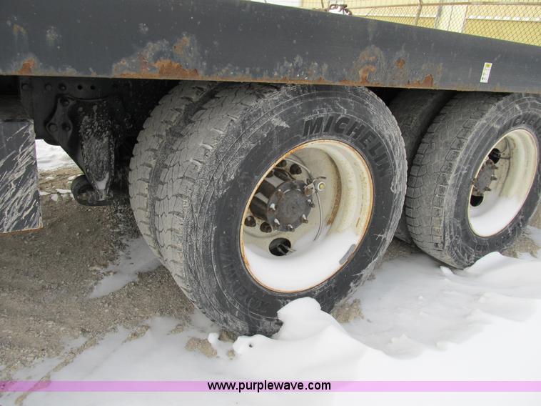 image for item B2586 2006 Freightliner M2 106 rollback truck