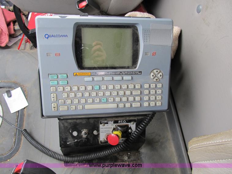 image for item B2586 2006 Freightliner M2 106 rollback truck