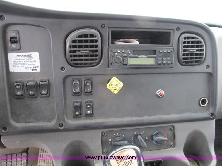 image for item B2586 2006 Freightliner M2 106 rollback truck