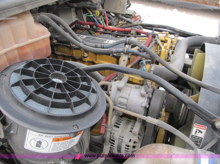 image for item B2586 2006 Freightliner M2 106 rollback truck