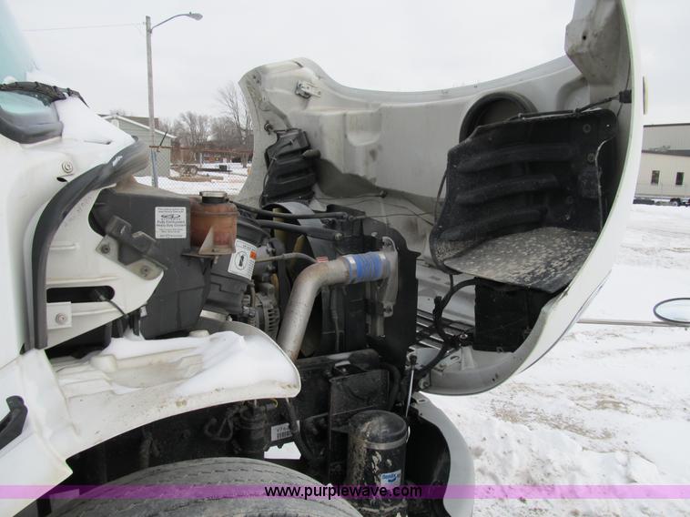 image for item B2586 2006 Freightliner M2 106 rollback truck