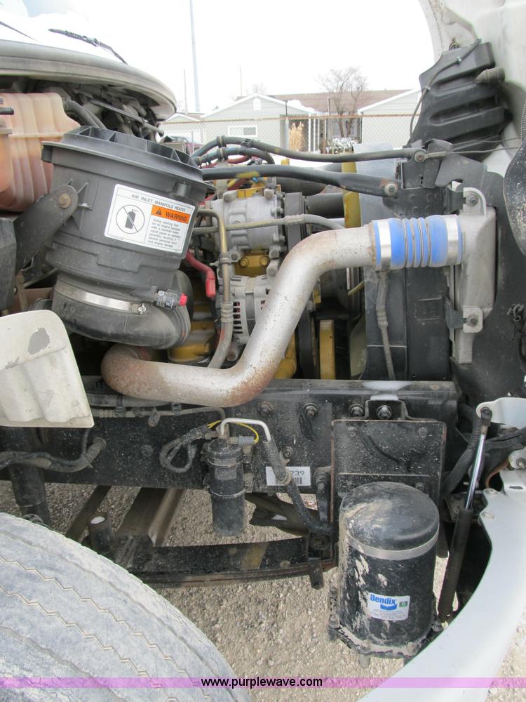 image for item B2586 2006 Freightliner M2 106 rollback truck