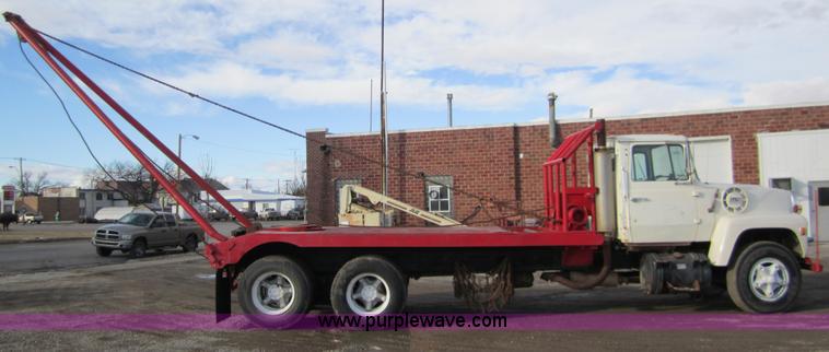 image for item B3157 1970 Ford 8000 winch pole truck