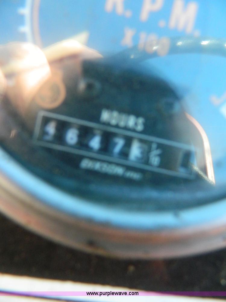 image for item D8698 1999 Ditch Witch 7510DD trencher with backhoe attachment