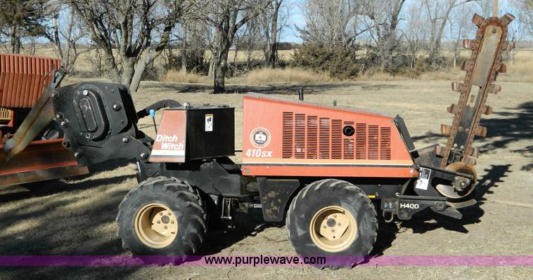image for item D8703 2000 Ditch Witch 410SXD vibratory plow with trencher