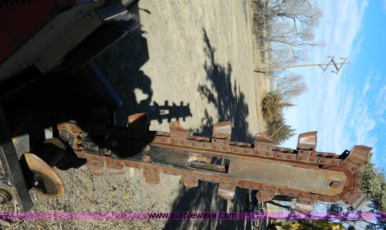 image for item D8703 2000 Ditch Witch 410SXD vibratory plow with trencher