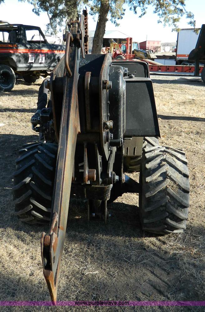 image for item D8703 2000 Ditch Witch 410SXD vibratory plow with trencher