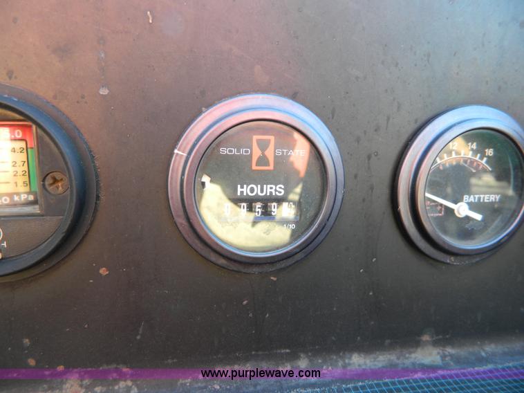 image for item D8703 2000 Ditch Witch 410SXD vibratory plow with trencher