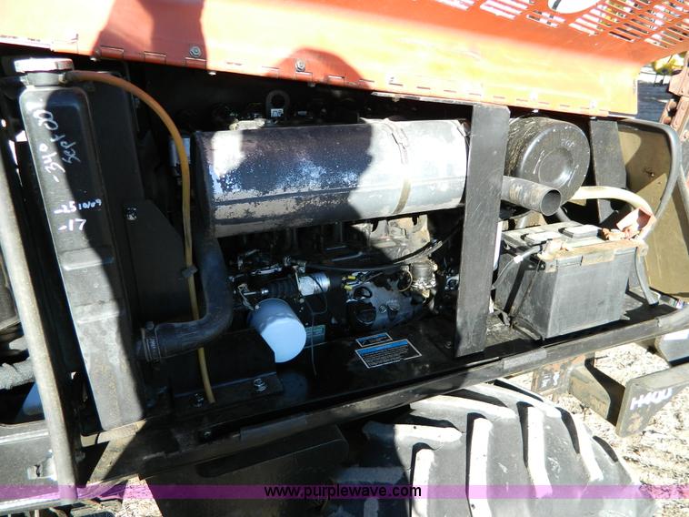 image for item D8703 2000 Ditch Witch 410SXD vibratory plow with trencher