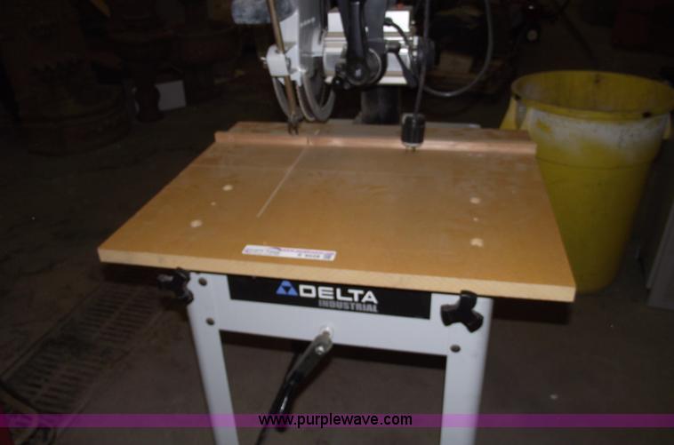 image for item E9528 Delta industrial radial arm saw and assorted tools