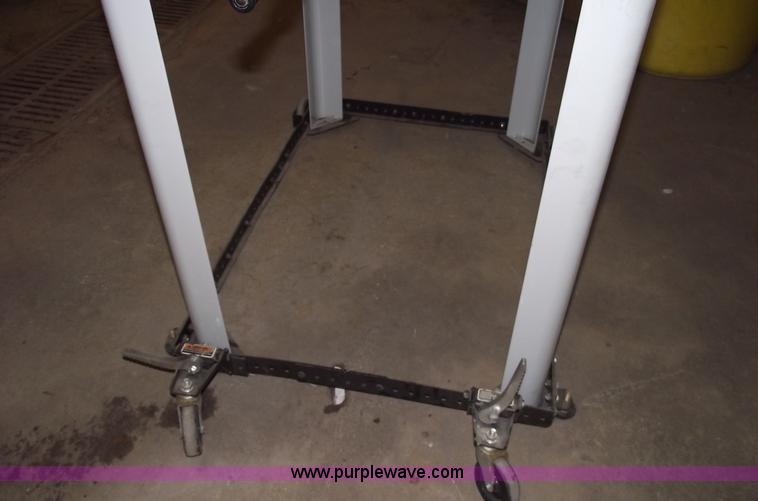 image for item E9528 Delta industrial radial arm saw and assorted tools