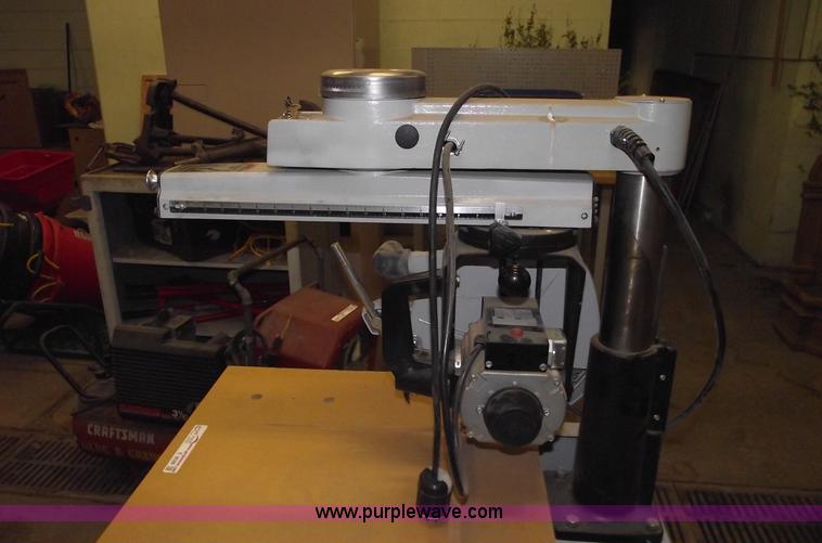 image for item E9528 Delta industrial radial arm saw and assorted tools