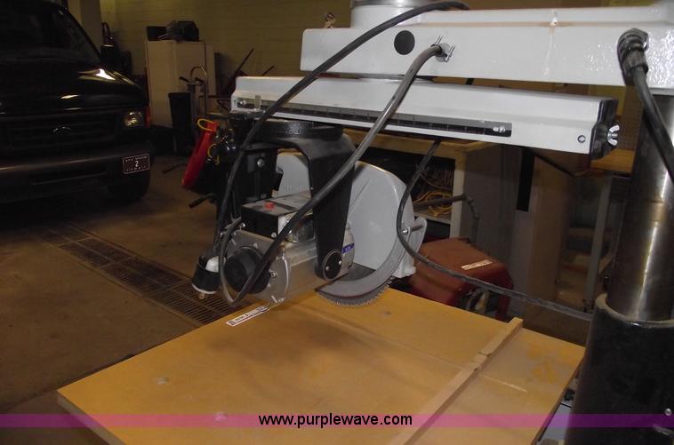 image for item E9528 Delta industrial radial arm saw and assorted tools