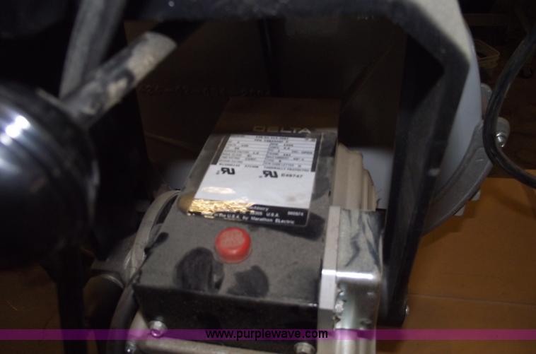 image for item E9528 Delta industrial radial arm saw and assorted tools