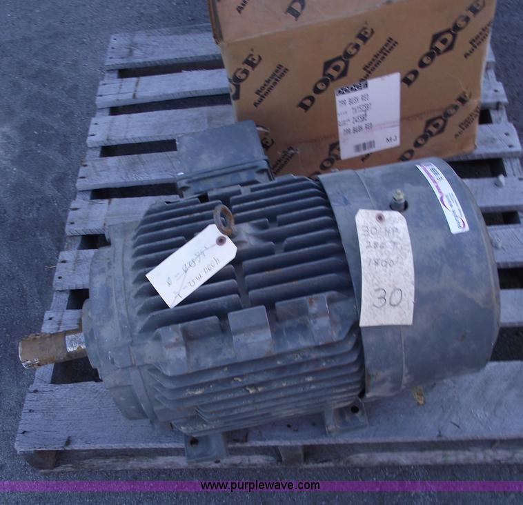 image for item E9556 Siemens 30 hp electric motor and Dodge torque arm double reduction