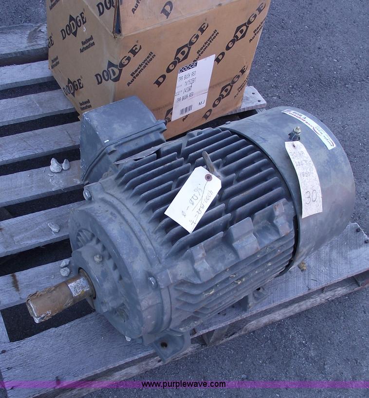 image for item E9556 Siemens 30 hp electric motor and Dodge torque arm double reduction