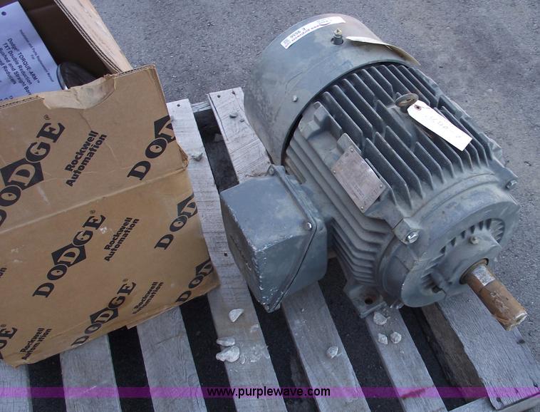 image for item E9556 Siemens 30 hp electric motor and Dodge torque arm double reduction
