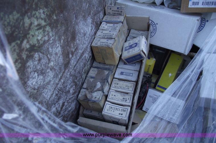 image for item E9565 Dump cart full of assorted industrial electric parts