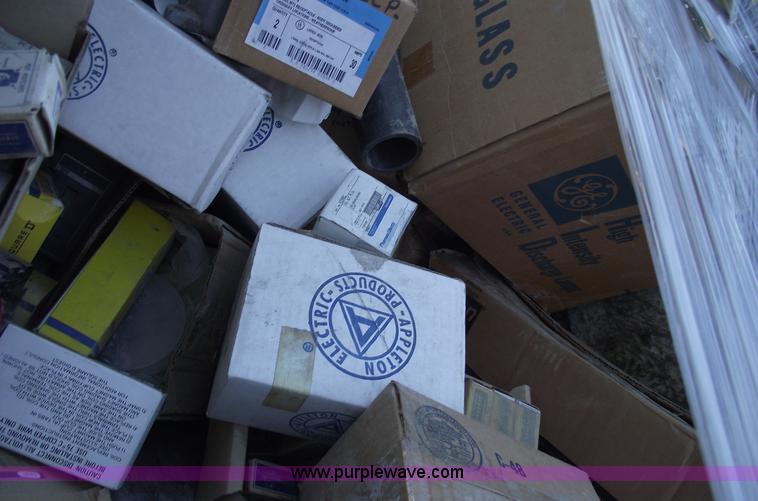 image for item E9565 Dump cart full of assorted industrial electric parts