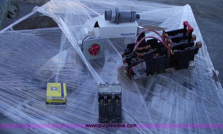 image for item E9565 Dump cart full of assorted industrial electric parts